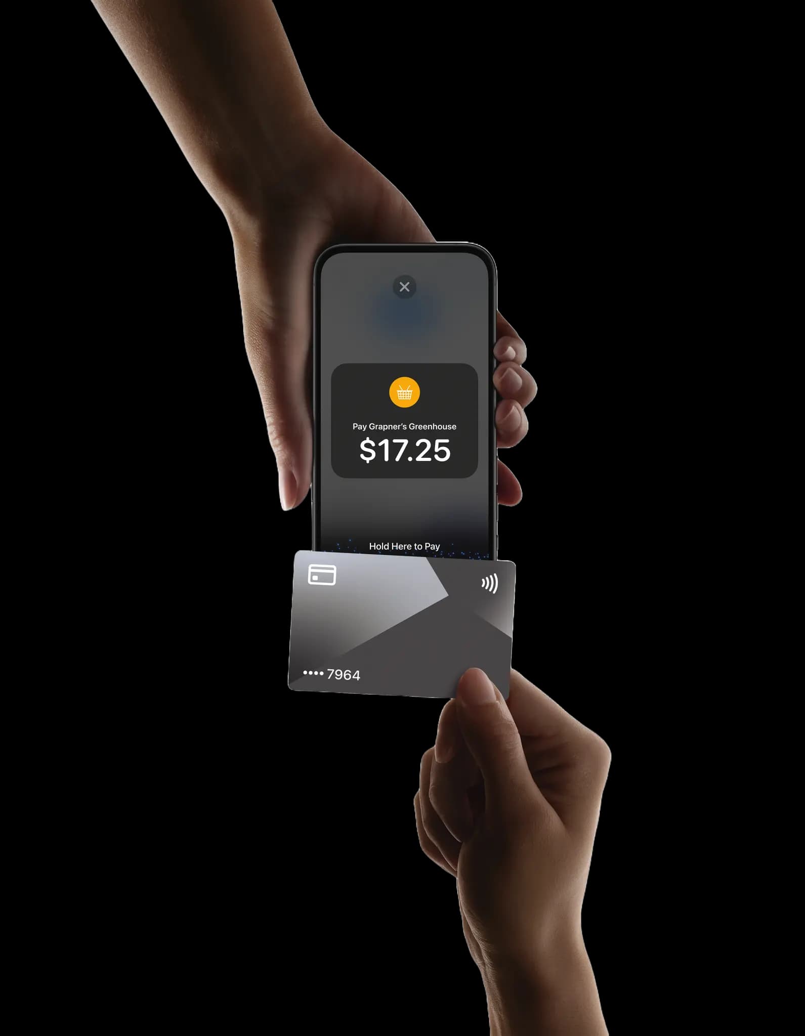 A customer taps a card to a phone accepting a contactless payment